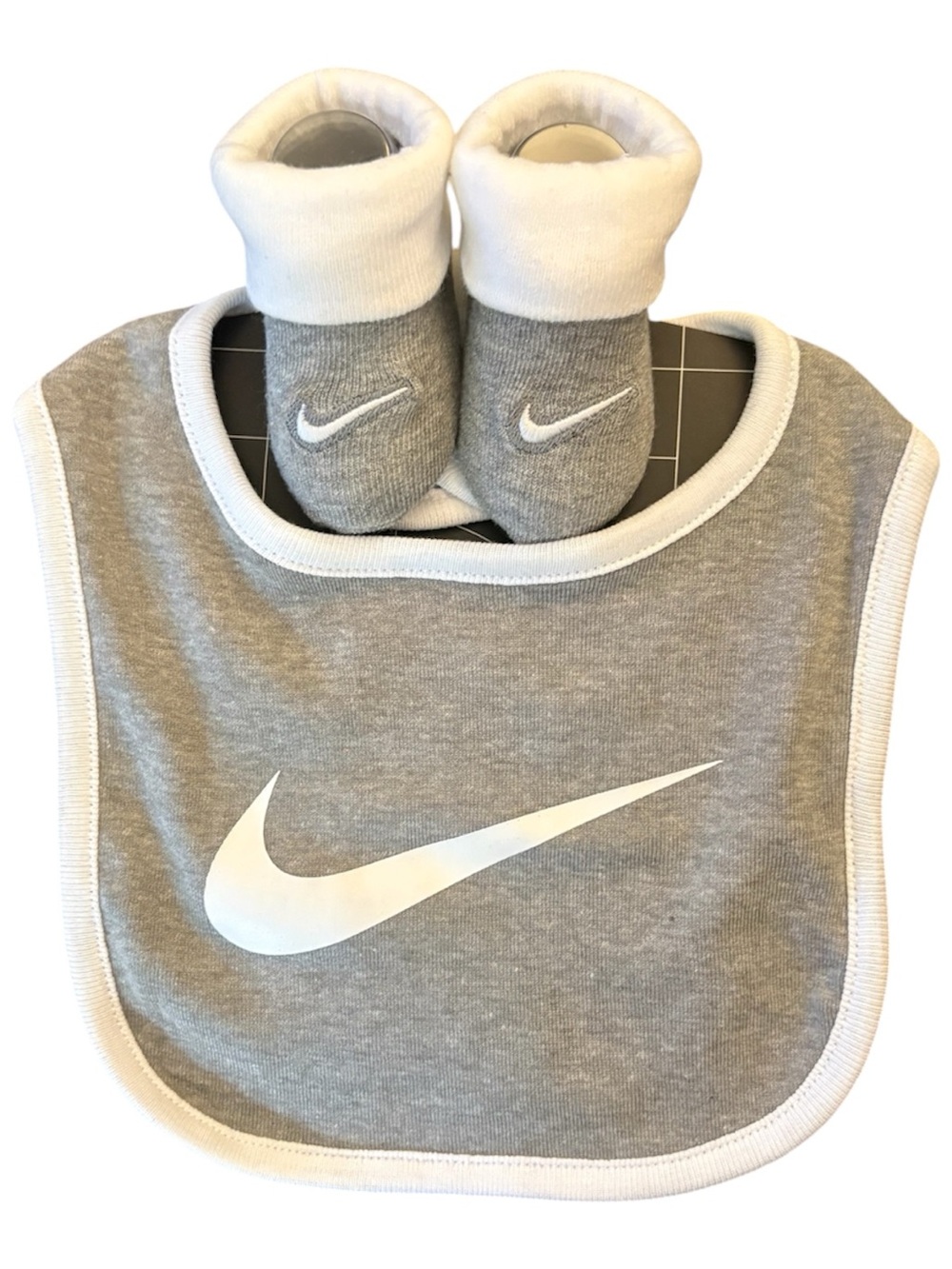 Nike Gray and White Baby Bib with Matching Booties